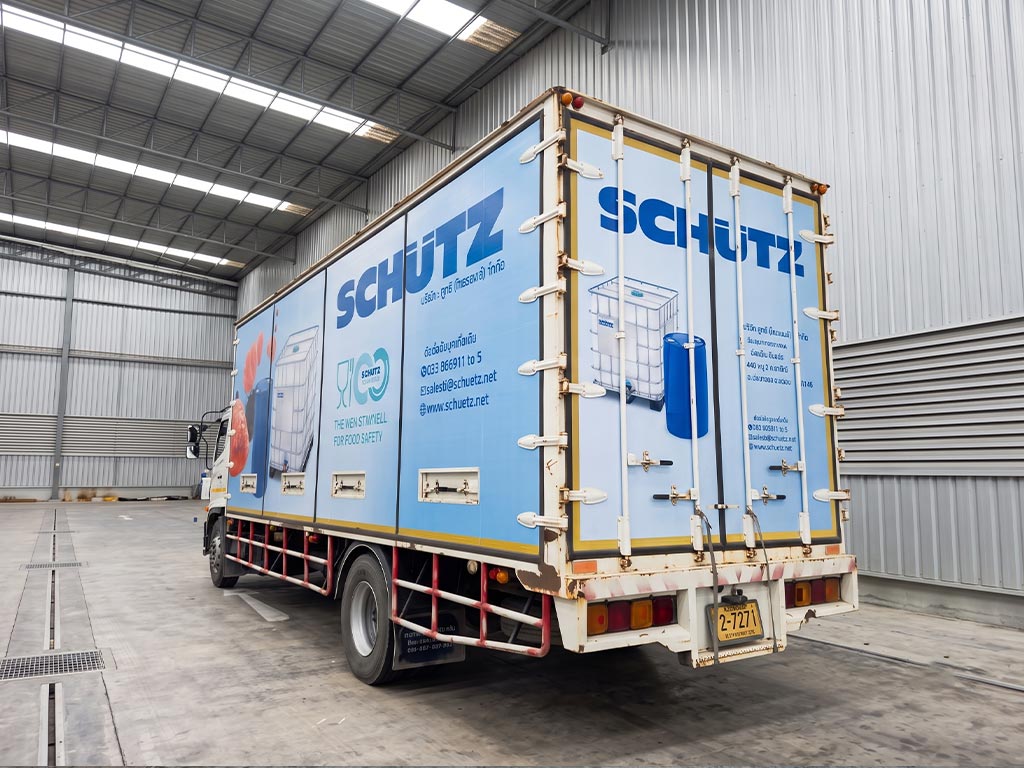 งานรีแบรนด์รถบริษัท ติดสติ๊กเกอร์ประตูหลังรถบรรทุก SCHUTZ พร้อมข้อมูลติดต่อ