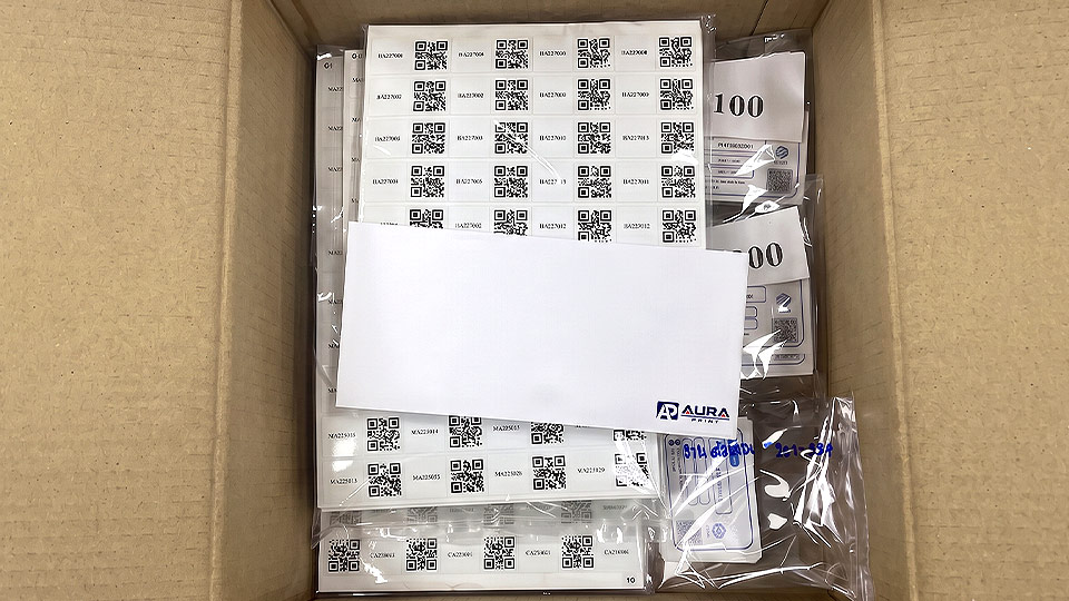 สติ๊กเกอร์บาร์โค้ดโรงงาน บรรจุกล่องคัดแยกซอง Ready-to-Apply พร้อมซอง Aura Print และป้ายระบุจำนวน