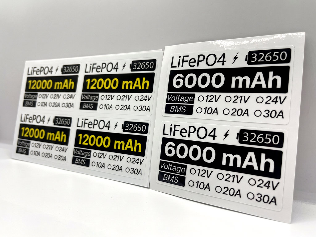 สติ๊กเกอร์ทนความร้อนป้ายสเปกแบตเตอรี่ LiFePO4 32650 รุ่น 12000 mAh และ 6000 mAh จัดเรียงเป็นแผ่น