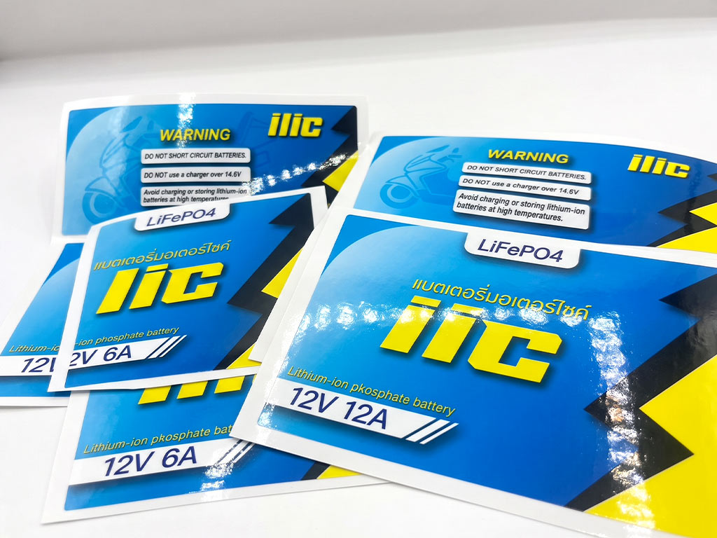 สติ๊กเกอร์ทนความร้อนแบตเตอรี่มอเตอร์ไซค์ ilic LiFePO4 สีฟ้าเหลือง ไดคัทพร้อมป้ายเตือนความปลอดภัย