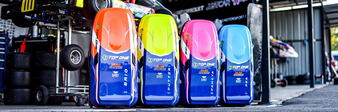สติ๊กเกอร์ Outdoor ทนสภาวะ Harsh บนกล่องอุปกรณ์มอเตอร์สปอร์ต TOP ONE สีส้ม เหลือง ชมพู ฟ้า ผิวมันเงาคมชัด
