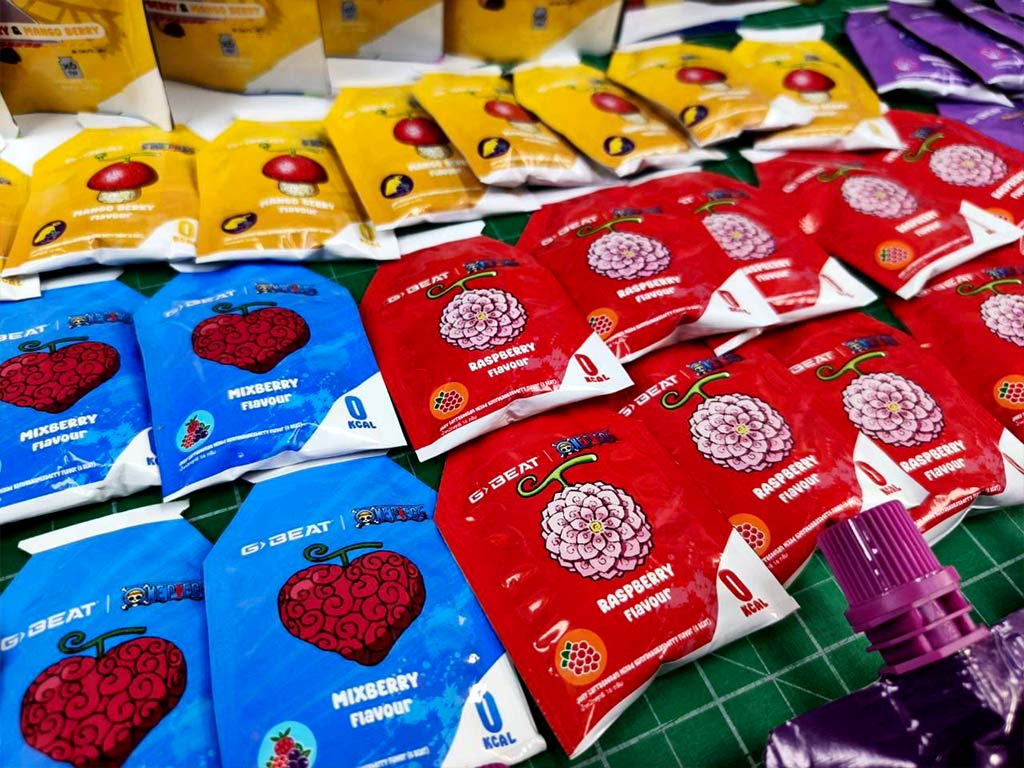 รับผลิตสติ๊กเกอร์ฉลาก อย. ซองไซส์มินิ 0 Kcal ลายผลไม้แฟนซี ซีล 3 ด้านสีฟ้า แดง เหลือง