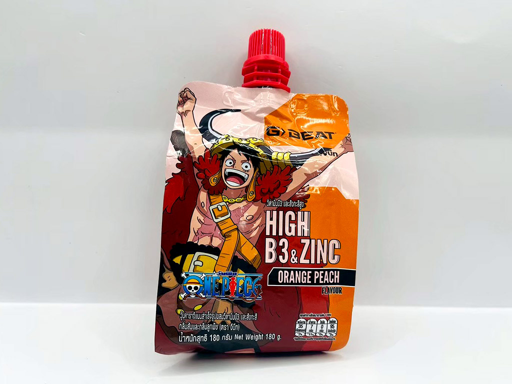 รับผลิตสติ๊กเกอร์ฉลาก อย. ซอง Spout Pouch กราฟิกสีส้มสดใสพร้อมตาราง GDA หวานมันเค็ม
